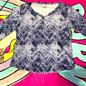 This is a beautiful shirt with 3quarter length sleeves. never really wore it.